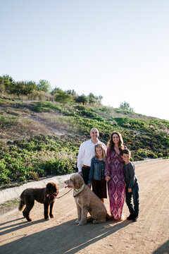 Family and Dogs Dressed Up and Posing for Photos in Southern Californi
