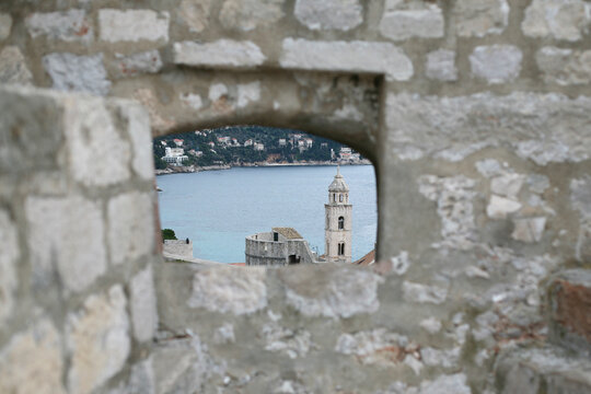 Looking through an ancient window in historic walled city of Dubrovnik