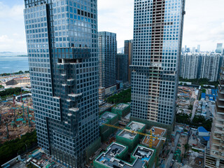 Obraz premium Shenzhen ,China - Circa 2022: Aerial view of construction site and landscape in Shenzhen city, China