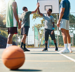 Teamwork, high five and sports with friends on basketball court for exercise, fitness and workout....
