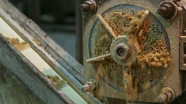Closeup of a soap plodder machine to refine soap or extrude