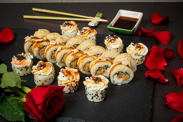 tasty sushi on the black background