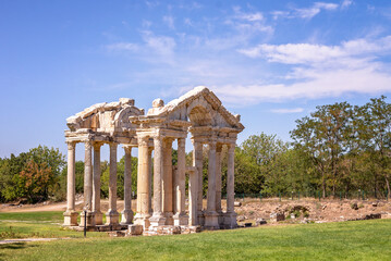 Fototapeta na wymiar ruins of roman temple Tetrapylon in Aphrodisias, a remarkably preserved Roman-period city in ancient Caria, Turkey, UNESCO World Heritage Centre