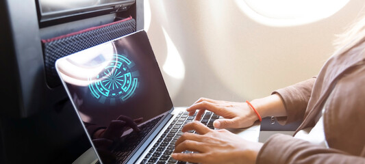 Nomad digital woman hand  as she is a freelance working  a vacation with laptop in  Airplane