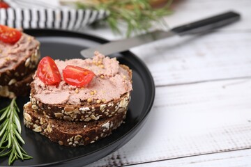 Delicious liverwurst sandwiches served on white wooden table, closeup. Space for text