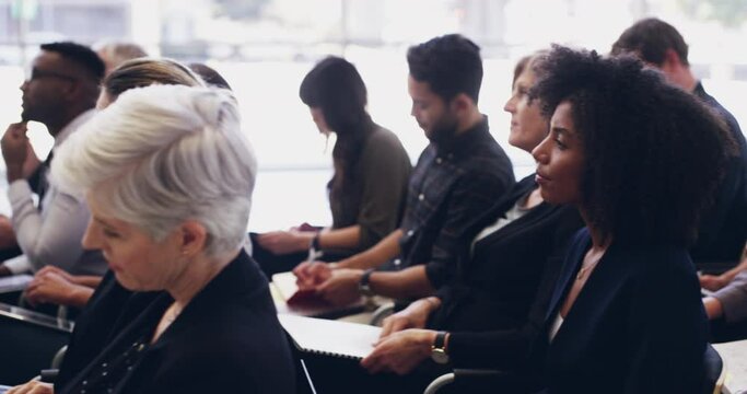 This is important...take note. 4k footage of a group of businesspeople attending a conference.