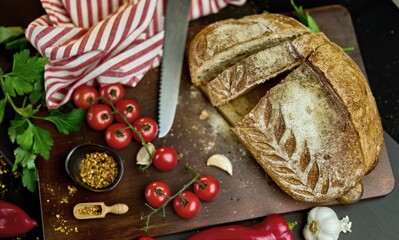 Fresh baked bread on the table - still life.