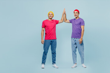 Full body young couple two friends men wear casual clothes looking camera together meeting together...