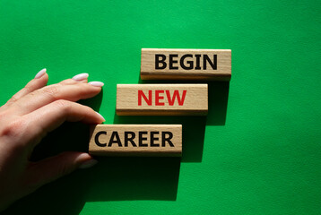 Begin new career symbol. Concept word Begin new career on wooden blocks. Businessman hand....