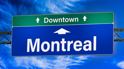 Road sign indicating direction to the city of Montreal