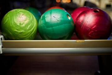 Bowling balls in stand. Colored bowling balls at bowling alley,relaxing and sport concept.
