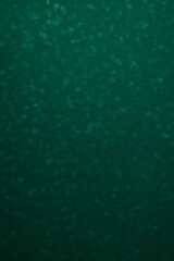 Dark green, billiard table felt soft rough textile material background texture closeup