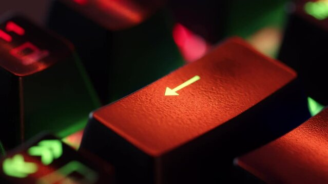Person is in doubt whether to press the BackSpace key or not. The finger hovers over the BackSpace key for a few seconds before deciding to press it. Yes or no concept. A heavy dicision do it or not.