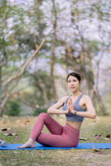 Young attractive woman doing yoga