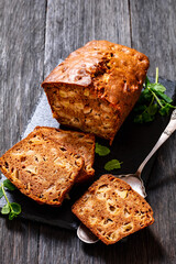 apple cinnamon bread on slate board, top view