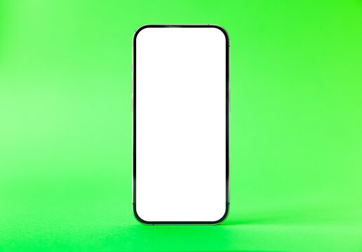 Mobile phone mockup on fresh green background