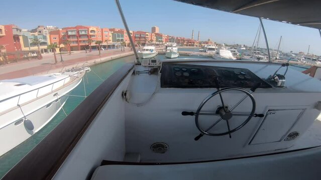 Pov panoramic view of Hurgada Marina Bay from luxury yacht, Egypt. Hurghada is popular summer vacation destionation on Red sea