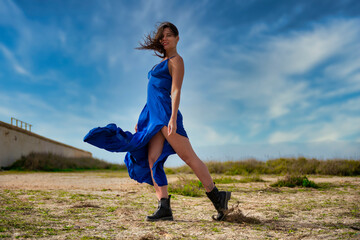 Empowered in Blue: A Woman's Strength and Confidence Shining Through
