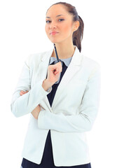 Portrait of a pretty young woman standing with folded hands on white background