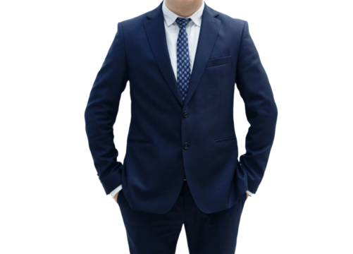 businessman standing with his hands in the pockets