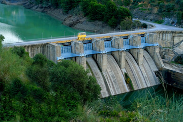 dam on river, Reservoir Condo del Guadalore, hydroelectric power plant, source using energy water stream, natural mountain resort El Chorro gorge, mountains andalusia, concept ecology, clean energy