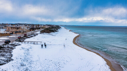 Neve sulla spiaggia a San Pietro in Bevagna,  Manduria, Taranto, Salento, Italy