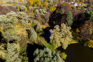 Rural landscape overlooking ponds in the middle of autumn nature