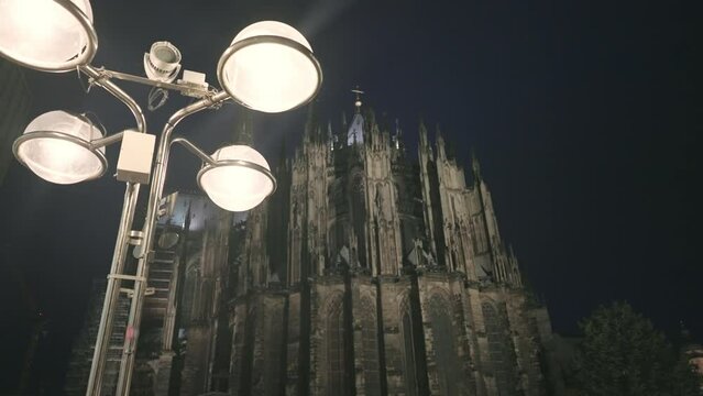 Illuminated Cologne Dom cathedral at night, Germany