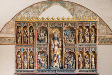 Andrew and the apostles on a wooden   altarpiece - Powered by Adobe