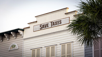 Obraz premium Street Sign Save Taxes