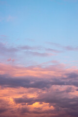 Red and dark clouds at sunset, vertical image for smartphone or tablet