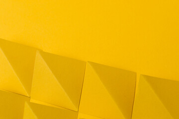 Abstract geometric yellow background with copy space