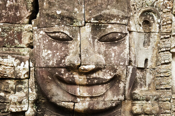 Face carved in stone in Angkor Wat