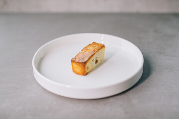 Delicious French almond flour cake on a plate. Close-up..