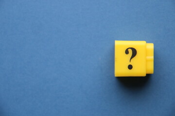Question mark on a blue background..