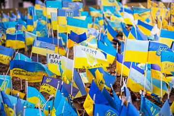  flags of Ukraine with a trident as a symbol of those who died in the war between Ukraine and...