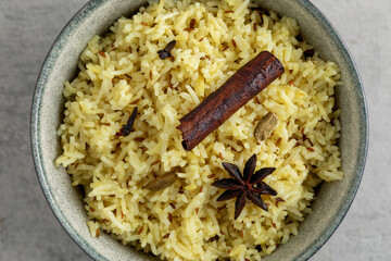 Jeera rice, Indian cuisine. Basmati rice with anise star, cardamom, cinnamon, cloves and cumin seeds.