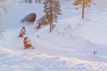 Passing snowmobiles