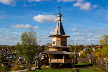 Pastoral view of a wooden Orthodox church built in the traditional Russian style in the...