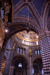 Fototapeta na wymiar Interior of Siena Cathedral (Italian: Duomo di Siena) is a medieval church in Siena, Italy, dedicated to the Assumption of Mary