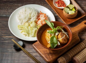 Curry Chicken Rice served in bowl isolated on table top view of taiwan food