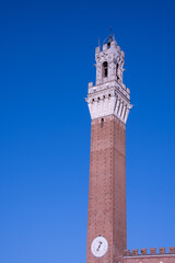 Fototapeta na wymiar Palazzo Publico and Torre del Mangia (Mangia tower) in Siena, Tuscany, Italy