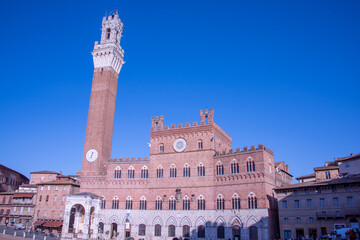 Piazza del Campo (Campo square), Palazzo Publico and Torre del Mangia (Mangia tower) in Siena, Tuscany, Italy