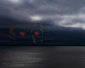 Skull waiting for victims in a storm