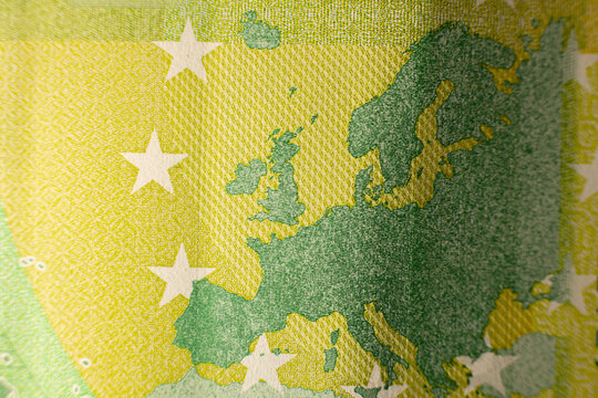 One hundred euro banknote. Euro money macro close-up. Individual details of the European Union's Euro cash, with a face value of one hundred euros. Saving for financial freedom concept.