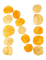 Letter N made of potato chips and isolated on png transparent background. Food alphabet concept. One letter of the set of potato chip font easy to stacking.