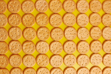 We lay out the background from round cookies. A tasty and sweet snack.