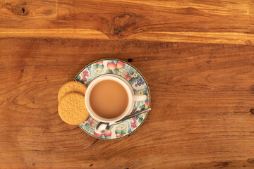 cup of coffee on table - obrazy, fototapety, plakaty