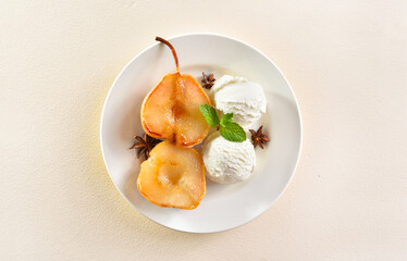 Poached pears with vanilla ice cream