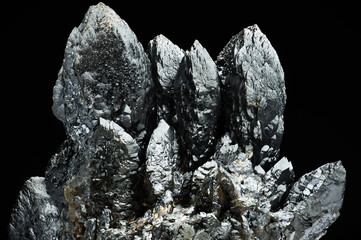 Fototapeta premium Descloizite specimen on black background. macro detail texture background. close-up raw rough unpolished semi-precious gemstone